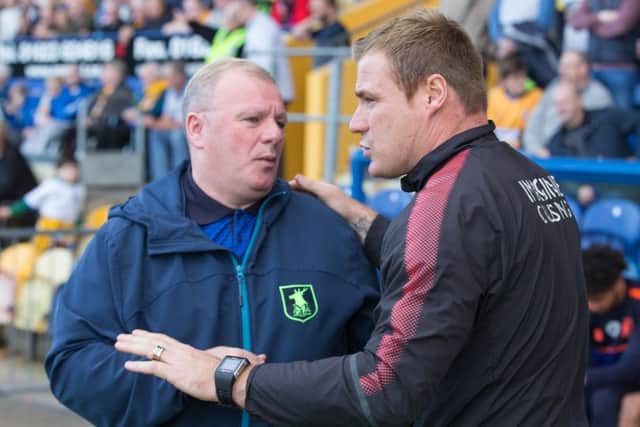 Mansfield Town vs Swindon Town -  Mansfield Town manager Steve Evans and Swindon Town manager David Flitcroft- Pic By James Williamson