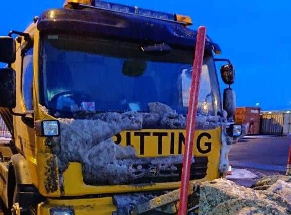 A gritter returns to the depot this morning.