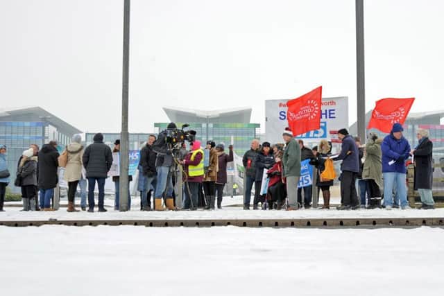 Protesters brave the snow to join the Save the NHS protest outside Kings Mill Hospital on Saturday.