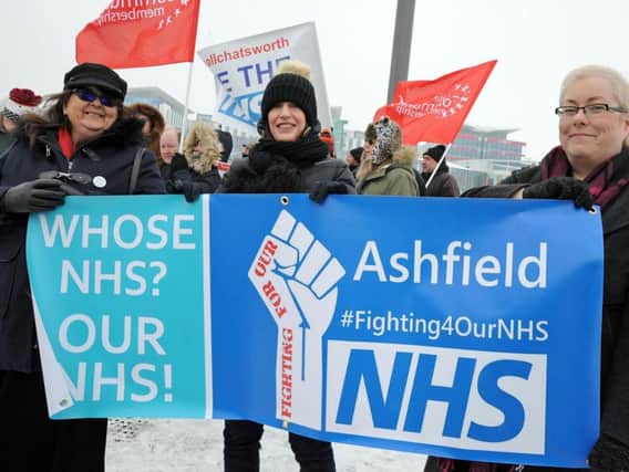 Campaigners fighting against cuts to the NHS made a stand outside the hospital on Mansfield Road, Sutton.