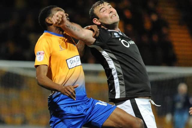 Mansfield Town v Lincoln City
Former Stag Matt Rhead in defensensive duty for Lincoln on Tuesday night.