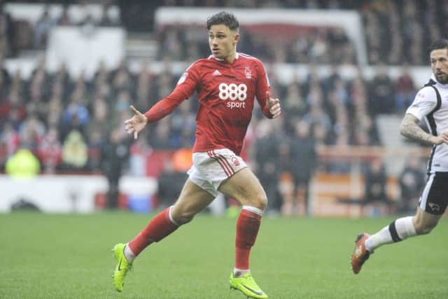 Matty Cash in action for Forest