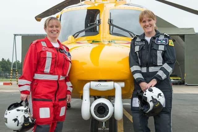 Dr Susan Dashey and co-pilot Anna Loake ready to start their shift on board the ambucopter.