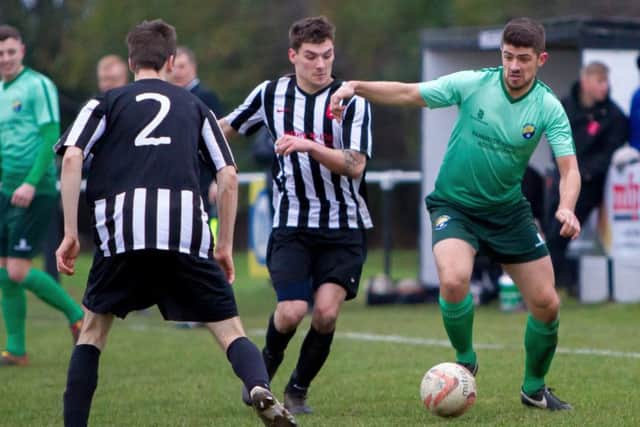 Clipstones youngsters in action as they strive to retain their pride at the bottom of the table.