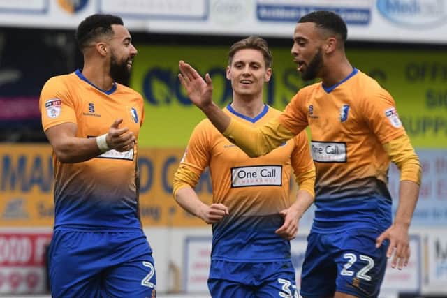 Picture Andrew Roe/AHPIX LTD, Football, EFL Sky Bet League Two, Mansfield Town v Colchester United, One Call Stadium, 10/03/18, K.O 3pm
Mansfield's Kane Hemmings celebrates his goal with his team mates
Andrew Roe>>>>>>>07826527594