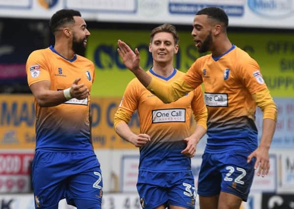 Picture Andrew Roe/AHPIX LTD, Football, EFL Sky Bet League Two, Mansfield Town v Colchester United, One Call Stadium, 10/03/18, K.O 3pm

Mansfield's Kane Hemmings celebrates his goal with his team mates

Andrew Roe>>>>>>>07826527594