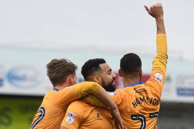 Picture Andrew Roe/AHPIX LTD, Football, EFL Sky Bet League Two, Mansfield Town v Colchester United, One Call Stadium, 10/03/18, K.O 3pmMansfield's Kane Hemmings celebrates his goal with his team matesAndrew Roe>>>>>>>07826527594