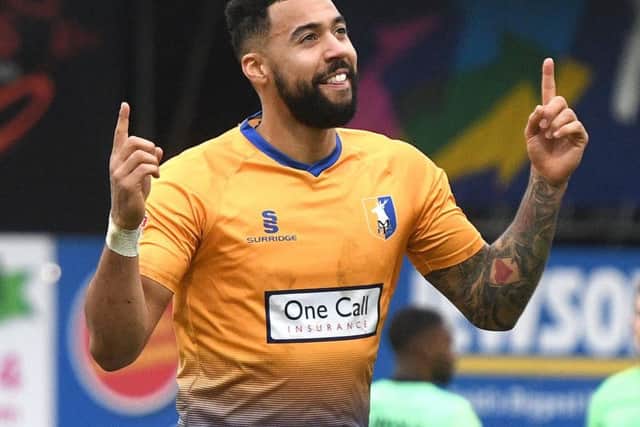 Kane Hemmings celebrates his goal.