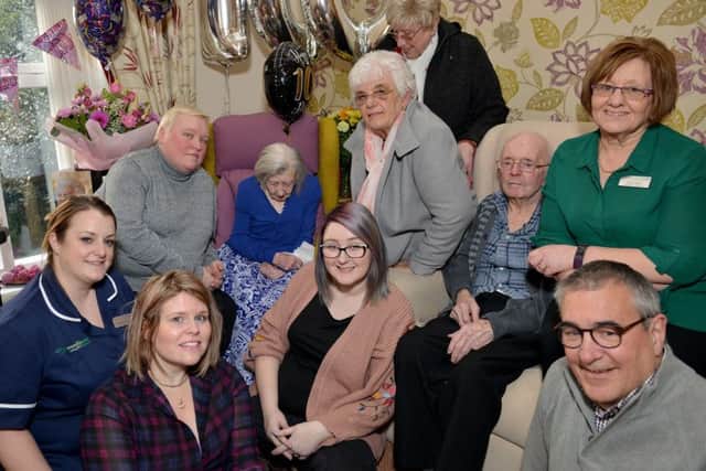Birthday party for 100 year old Beryl Davies at Woodleigh Christian Care Home, Beryl is pictured with staff and family