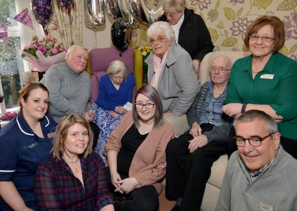 Birthday party for 100 year old Beryl Davies at Woodleigh Christian Care Home, Beryl is pictured with staff and family