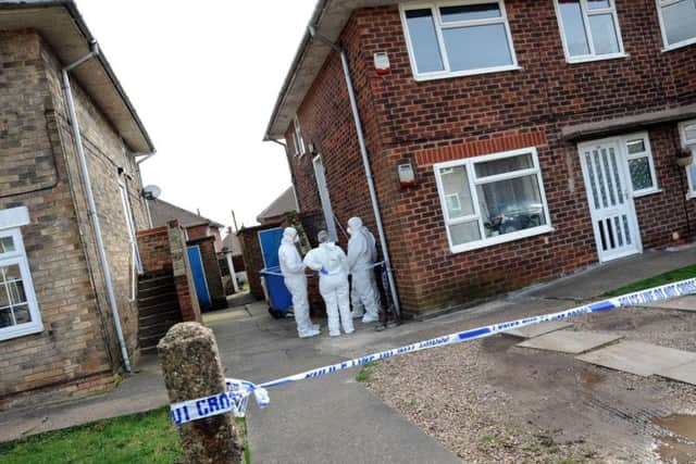 Crime scene investigators are currently at an cordoned off address.