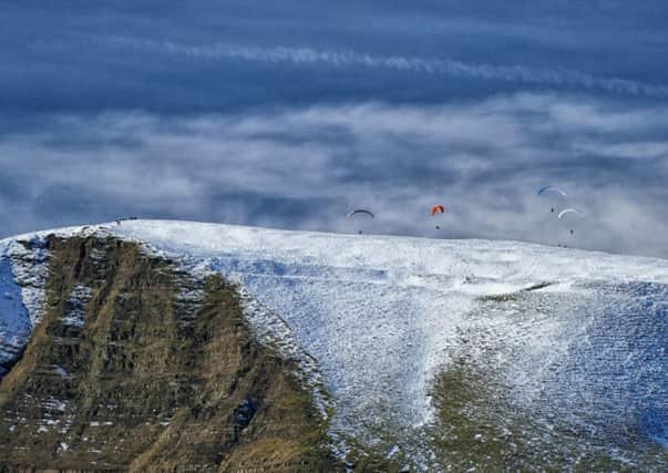 Michael Hardy captured this phenomenal shot of a snow-capped Mam Tor complete with paragliders.