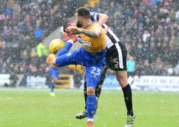 Picture by Howard Roe/AHPIX.com;Football;Skybet; League Two;EFL;
Notts County v Mansfield Town
17/3/2018  KO 1.00 pm; Meadow Lane;
copyright picture;Howard Roe;07973 739229

Stag's Kane Hemmings tussles with County's Richard Duffy
