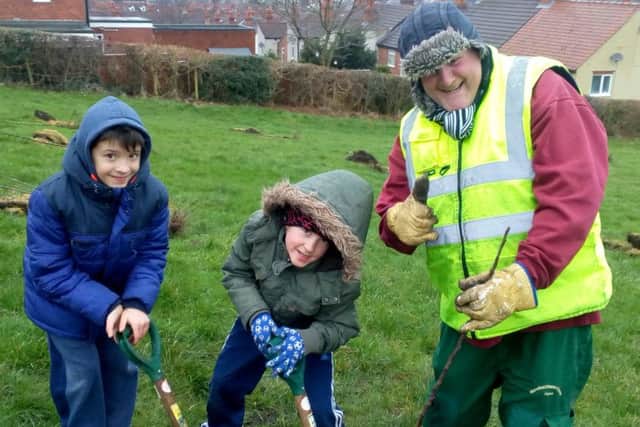 Pupils from Asquith Primary School taking part in the tree planting event