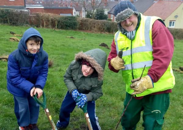 Pupils from Asquith Primary School taking part in the tree planting event