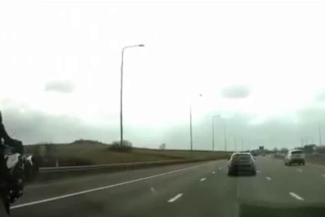 One of the bikers can be seen stood up pulling a wheelie in the footage