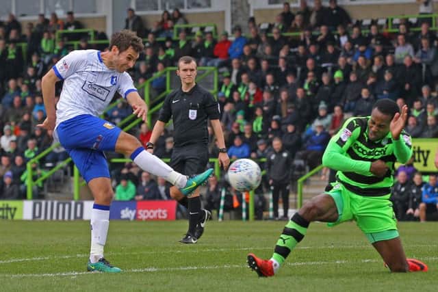 Picture by Gareth Williams/AHPIX.com; Football; Sky Bet League Two; Forest Green Rovers v Mansfield Town; 24/3/18  KO 15.00; The New Lawn; copyright picture; Howard Roe/AHPIX.com;Stags' Will Atkinson sees his effort blocked by Rovers' Dale Bennett