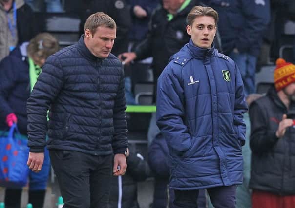 Picture by Gareth Williams/AHPIX.com; Football; Sky Bet League Two; Forest Green Rovers v Mansfield Town; 24/3/18  KO 15.00; The New Lawn; copyright picture; Howard Roe/AHPIX.com; Stags boss David Flitcroft leaves at full-time with striker Danny Rose in a protective boot after his early injury