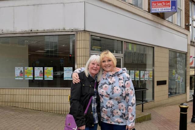 Pictured from left is Chris Kenzie and Sandra Marshall out side of the shop.