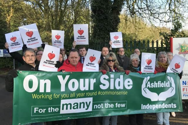 Campaigners with the banner in question