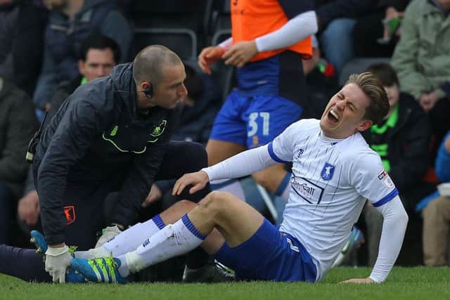 Picture by Gareth Williams/AHPIX.com; Football; Sky Bet League Two; Forest Green Rovers v Mansfield Town; 24/3/18  KO 15.00; The New Lawn; copyright picture; Howard Roe/AHPIX.com; Mansfield's Danny Rose feels the pain of an early challenge and has to be substituted