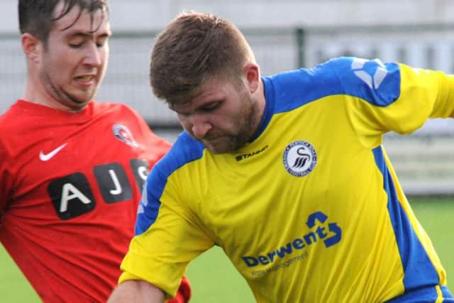Guy Wilding, pictured here in action for Swanwick (yellow shirt) against Eastwood CFC, made his Selston debut on Wednesday night