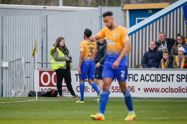 Mansfield Town's Mal Benning is given a red card and sent off