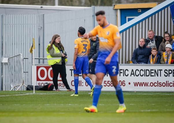 Mansfield Town's Mal Benning is given a red card and sent off