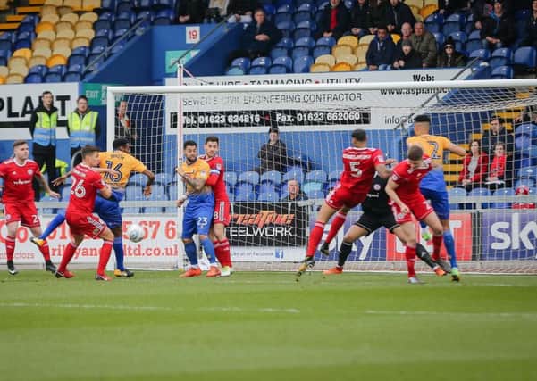 Mansfield Town make an early attack on the Accrington goal