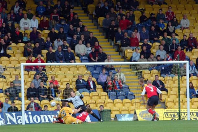 Richard Walker scores the opener.
