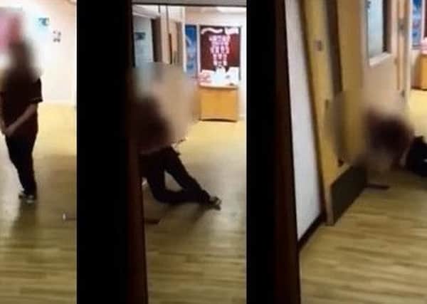The care worker is shown 'imitating' the elderly patient by shuffling and falling into a wall