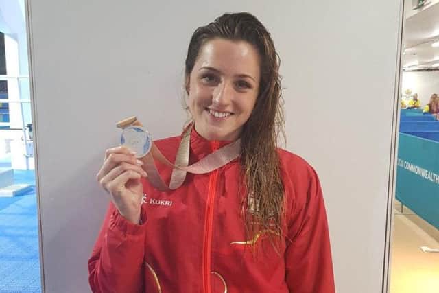 Molly Renshaw with her silver medal. Photo: Twitter/@swim_england
