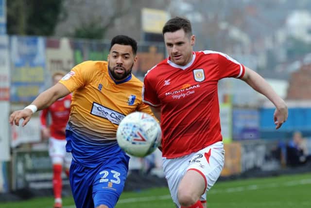 Kane Hemmings (left) in action against Crewe.