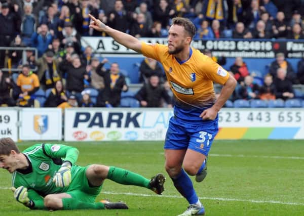 Ricky Miller pulls a third goal back for the Stags.