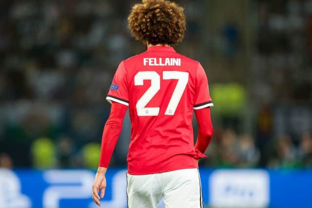 Manchester United midfielder Marouane Fellaini, who could soon be joining Liverpool, according to today's rumour mill.