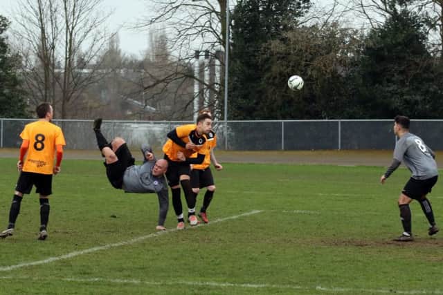 St Joey's in Grey, Oddfellows in Orange.
A tremendous scissor kick by St Joey's Ste Hutchinson flew just wide of a post.