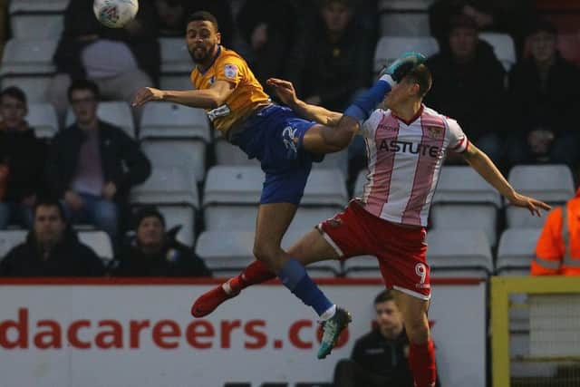 Picture by Gareth Williams/AHPIX.com; Football; Sky Bet League Two; Stevenage v Mansfield Town; 10/18 KO 19.45; The Lamex Stadium; copyright picture; Howard Roe/AHPIX.com; Stags CJ Hamilton leaps with Stevenage's Alex Revell