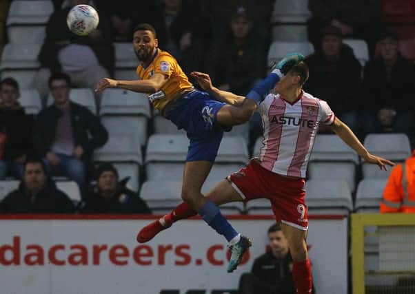 Picture by Gareth Williams/AHPIX.com; Football; Sky Bet League Two; Stevenage v Mansfield Town; 10/18  KO 19.45; The Lamex Stadium; copyright picture; Howard Roe/AHPIX.com; Stags CJ Hamilton leaps with Stevenage's Alex Revell