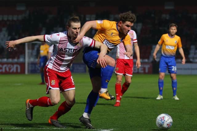 Picture by Gareth Williams/AHPIX.com; Football; Sky Bet League Two; Stevenage v Mansfield Town; 10/18 KO 19.45; The Lamex Stadium; copyright picture; Howard Roe/AHPIX.com; Stags' Alex McDonald forces his way past Stevenage's Ben Sheaf
