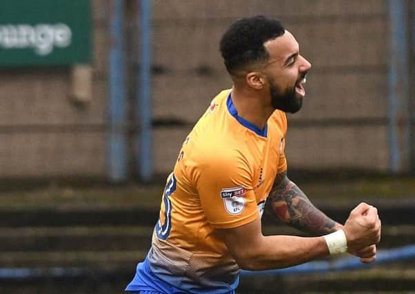 Picture Andrew Roe/AHPIX LTD, Football, EFL Sky Bet League Two, Mansfield Town v Colchester United, One Call Stadium, 10/03/18, K.O 3pm

Mansfield's Kane Hemmings celebrates his goal

Andrew Roe>>>>>>>07826527594