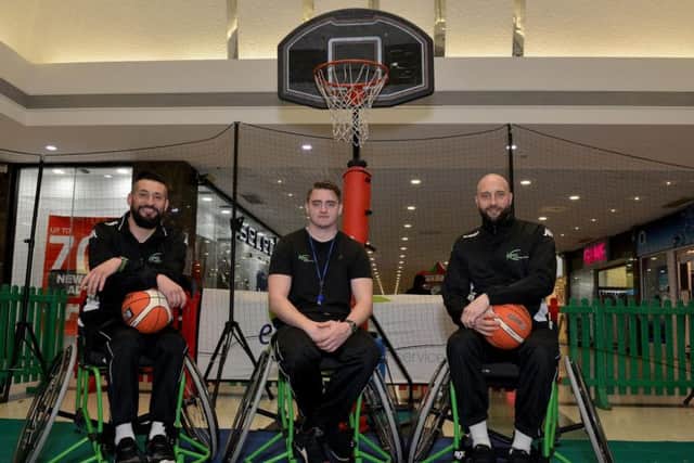 Wheelchair basketball demonstration at Four Seasons Shopping Centre, Mansfield, part of the Health and Wellbeing Festival, pictured are Gary Collins, Lee Brookes and Dan Richards from Express Coaching Services