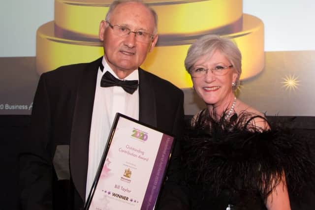 Veteran businessman Bill Taylor receives his Outstanding Contribution award from Coun Kate Allsop, ther Executive Mayor of Mansfield.