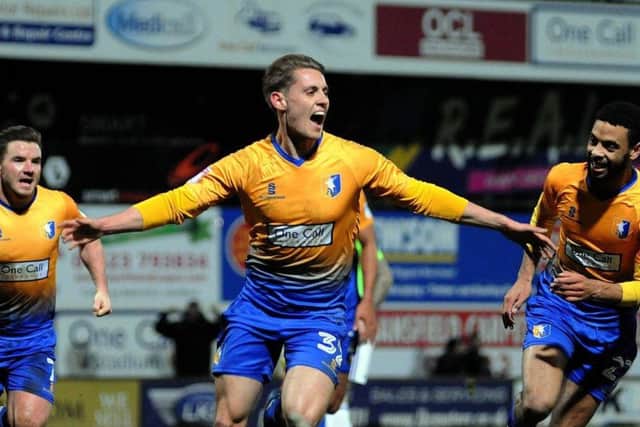 Danny Rose celebrates scoring for Mansfield.