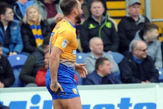 Mansfield Town v Crewe Alexander
Ricky Miller pulls up before going on to score Mansfield's third.