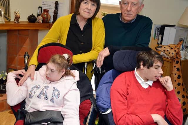 Robert and Julia Jordan with grandchildren Geneva and Toby Jordan. Skegby house where houses will be built 4 metres from the grandchildrens windows.