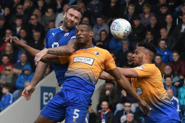 Picture Andrew Roe/AHPIX LTD, Football, EFL Sky Bet League Two, Chesterfield v Mansfield Town, Proact Stadium, 14/04/18, K.O 1pmChesterfield's Ian Evatt has a header on goalAndrew Roe>>>>>>>07826527594