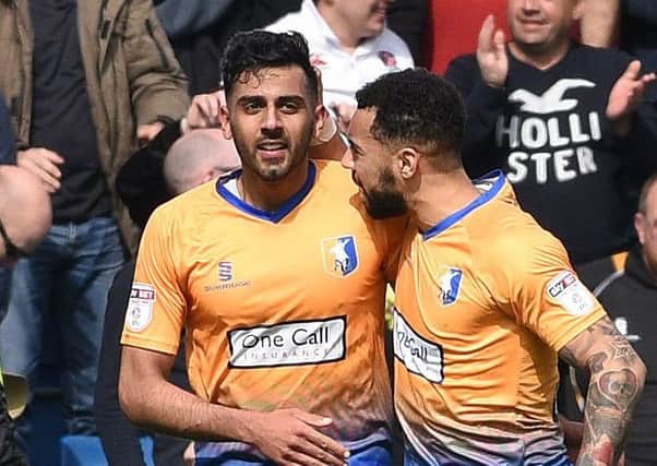 Picture Andrew Roe/AHPIX LTD, Football, EFL Sky Bet League Two, Chesterfield v Mansfield Town, Proact Stadium, 14/04/18, K.O 1pm

Mansfield's Mal Benning celebrates his winning goal with Kane Hemmings

Andrew Roe>>>>>>>07826527594