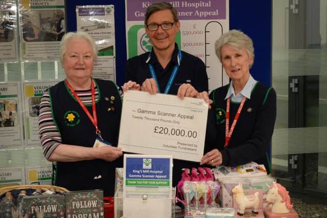 Volunteer Marlene Poole, nuclear medicine specialist Robert Bradley and volunteer Sue Groves.