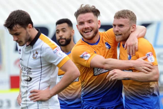 Mansfield Town v Port Vale.   Alex MacDonald and Alfie Potter's joy was short lived in the second half.