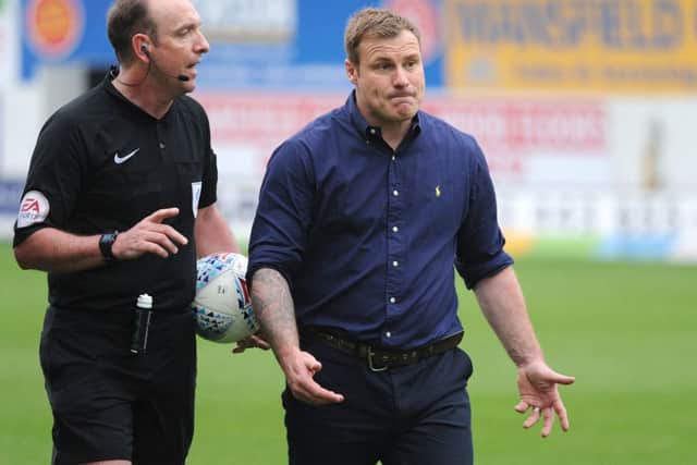 Mansfield Town v Port Vale.
David Flitcroft with the referee after Saturday's game against Port Vale.